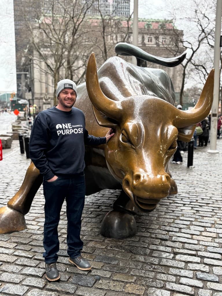 Kody Nelson at Wall Street's Charging Bull in One Purpose Trading gear.